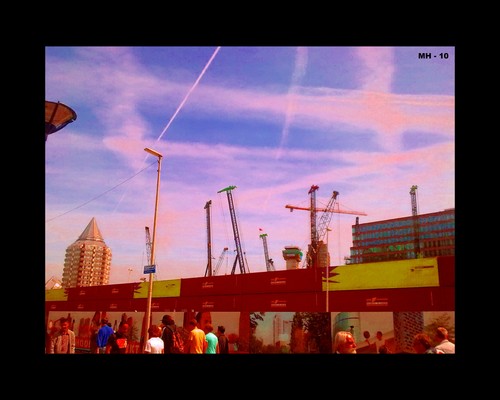 Cartoon: Clouds Cranes People Passing by (medium) by MoArt Rotterdam tagged clouds,cranes,people,passingby,bouwputblaak,blaakrotterdam
