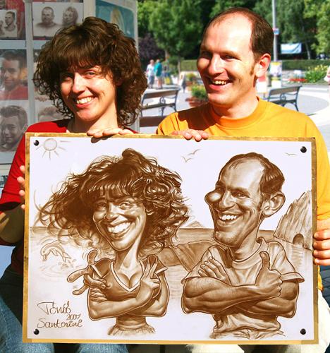 Cartoon: Caricature live on the street (medium) by Tonio tagged portrait,funny,picture,santorini,greece