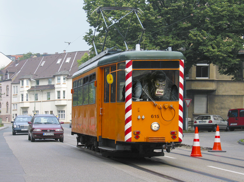 Cartoon: Ein Kindertraum (medium) by signotime tagged straßenbahn,verkehr,traffic,beruf,job,monster